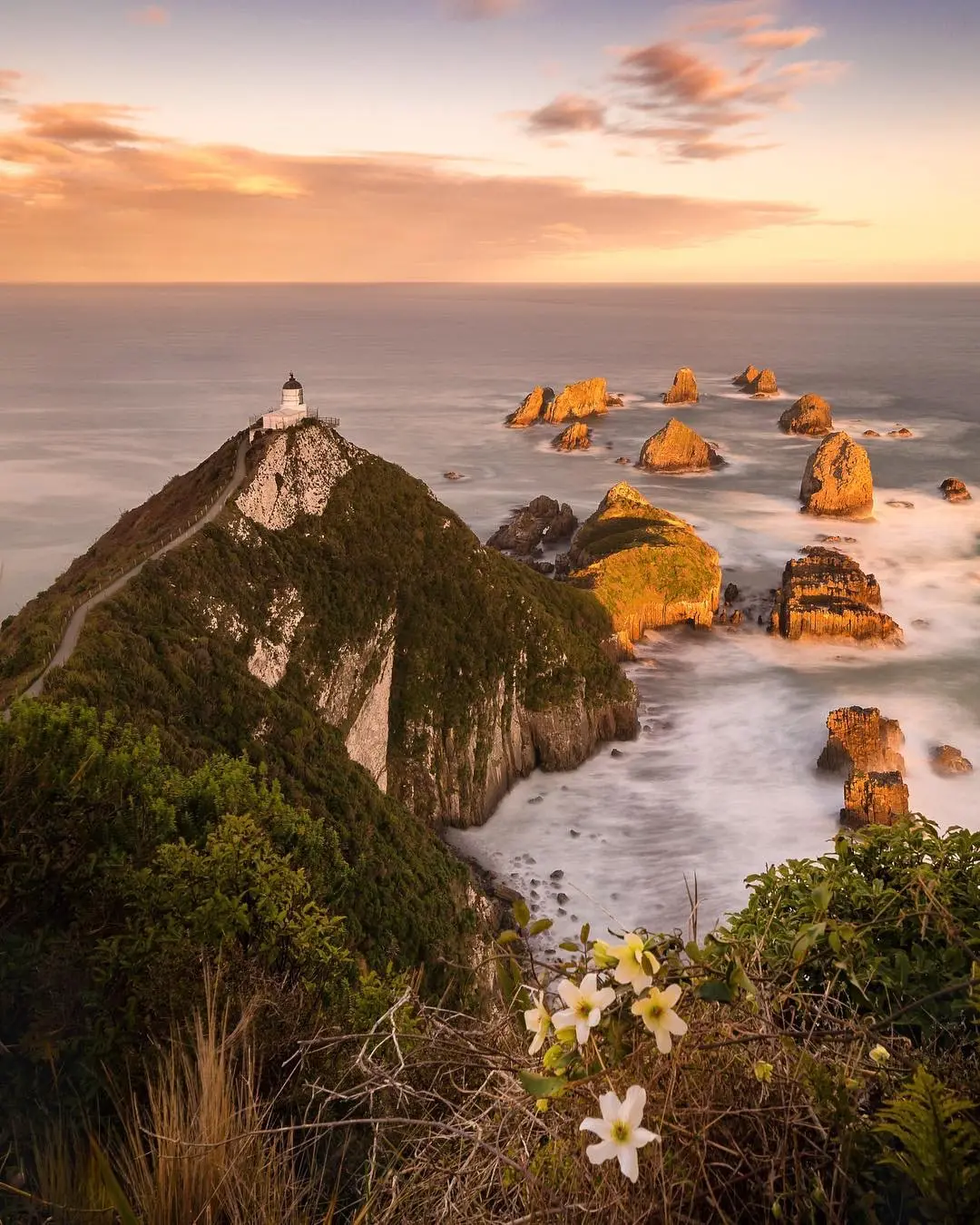 Photography on a lighthouse facing a stormy sea