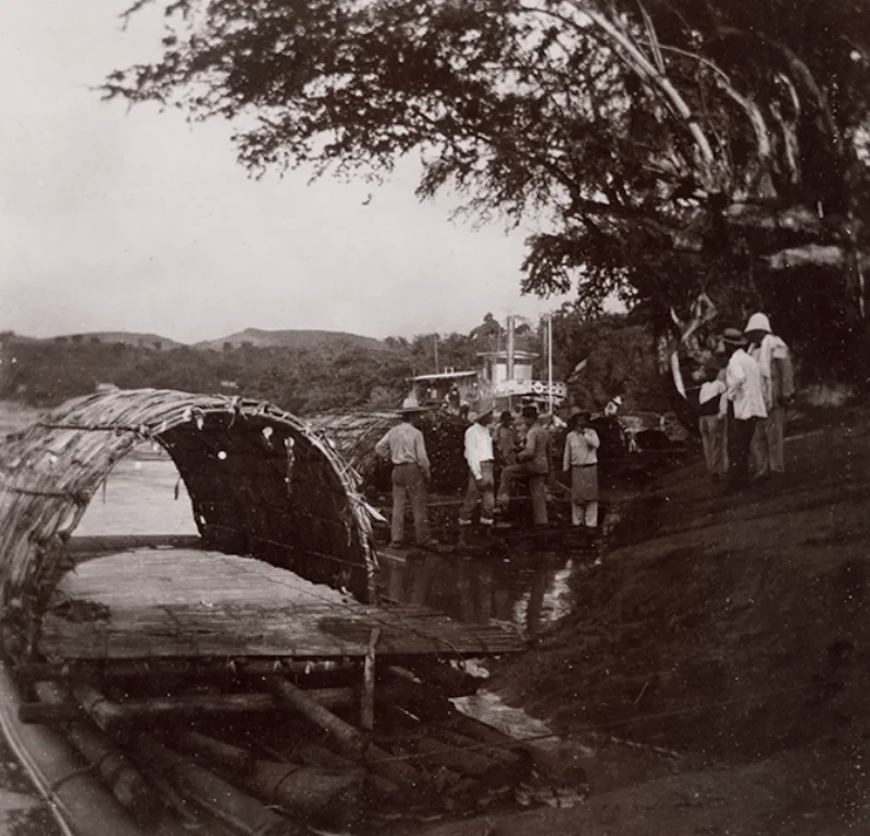 Group of people near a water source from the 19th century, history of photography