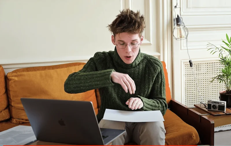Portrait of photographer Jonathan Bertin with his laptop