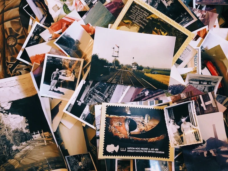 Pile of pictures representing the paper and chemical use for eco-responsible photography