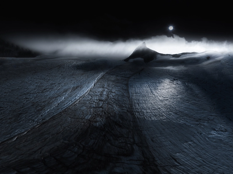 Photography of a glacial landscape with a mountain in the background