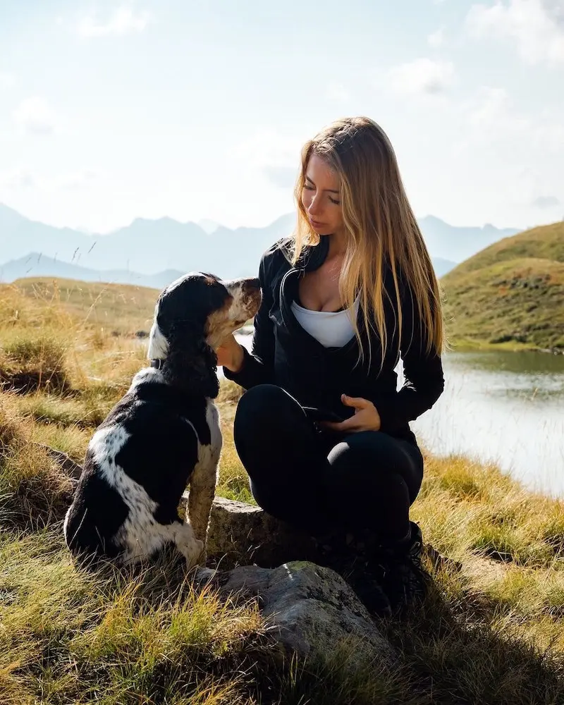 Portrait of Clarisse de Thoisy, photographer and videographer, with her dog