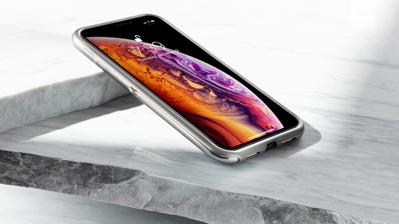 Studio photography of an iPhone on a marble stand, taken by Masaki Okumura, design and art photographer